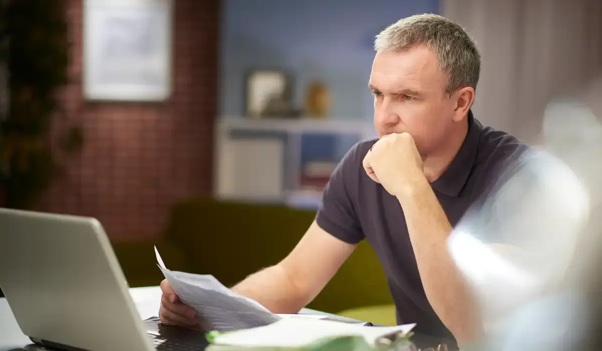 man in his 40s worried about pre-construction market